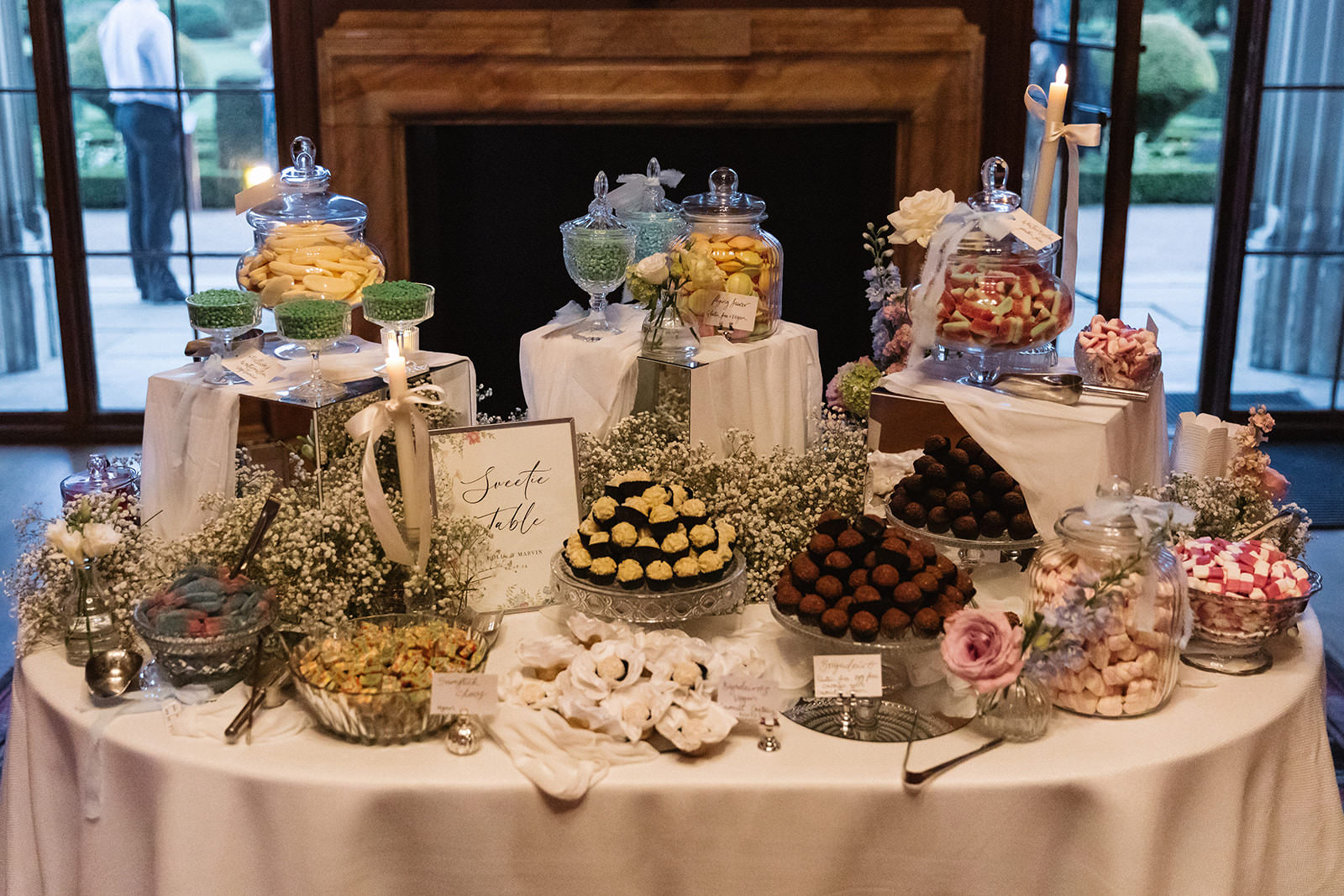 Elegant wedding sweetie table at Ashridge House styled by Knots and Nuptials luxury wedding planner Hertfordshire